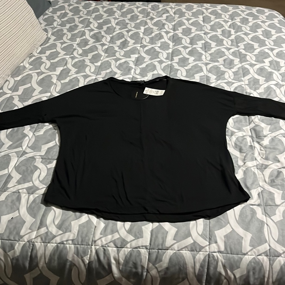Brand new woman’s 3/4 sleeve black shirt with tags price 15.00